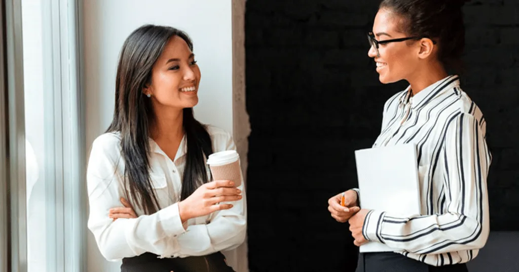A happy, excited businesswoman enthusiastically supports her colleague's idea.