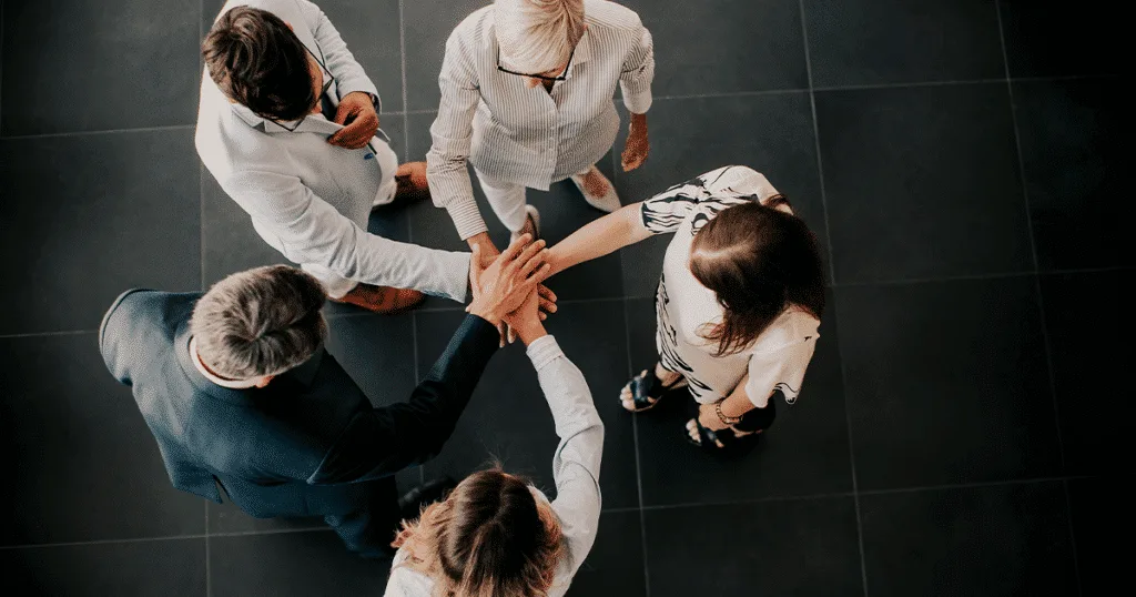 Young group of people discussing ideas during a meeting at work.
