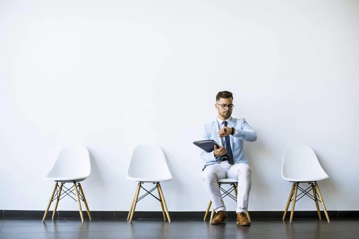 The candidate is waiting for his turn for an interview.