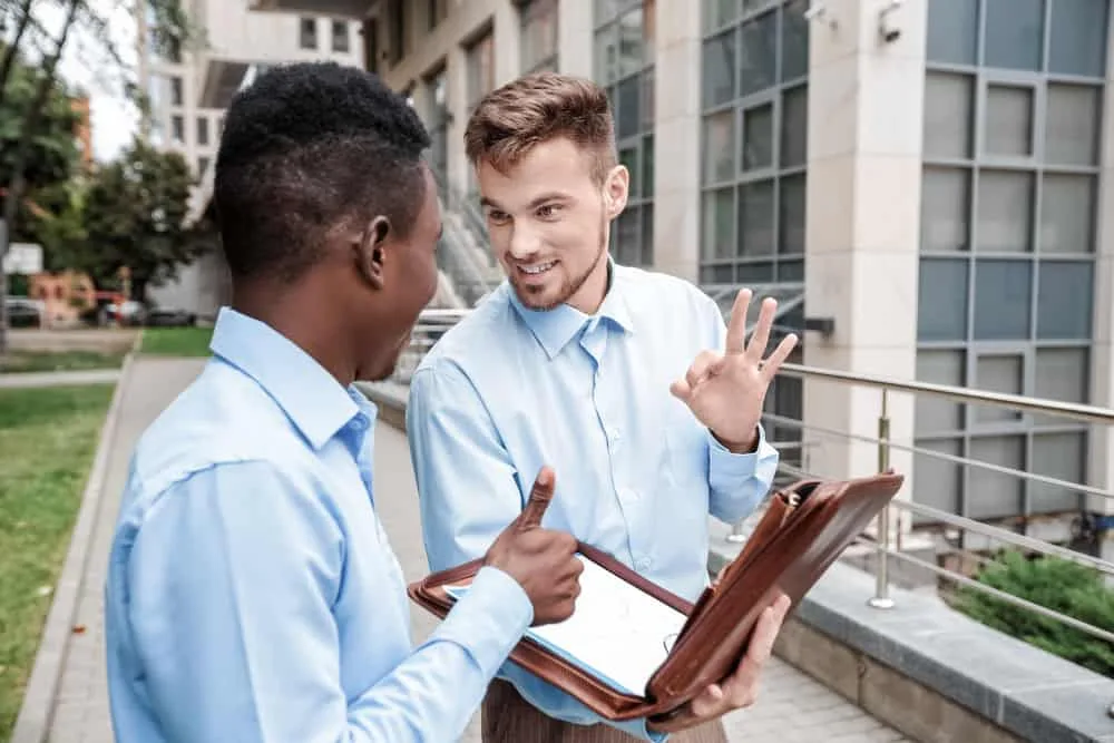 Recruiter Explaining the Pros of Working with Company to Candidate