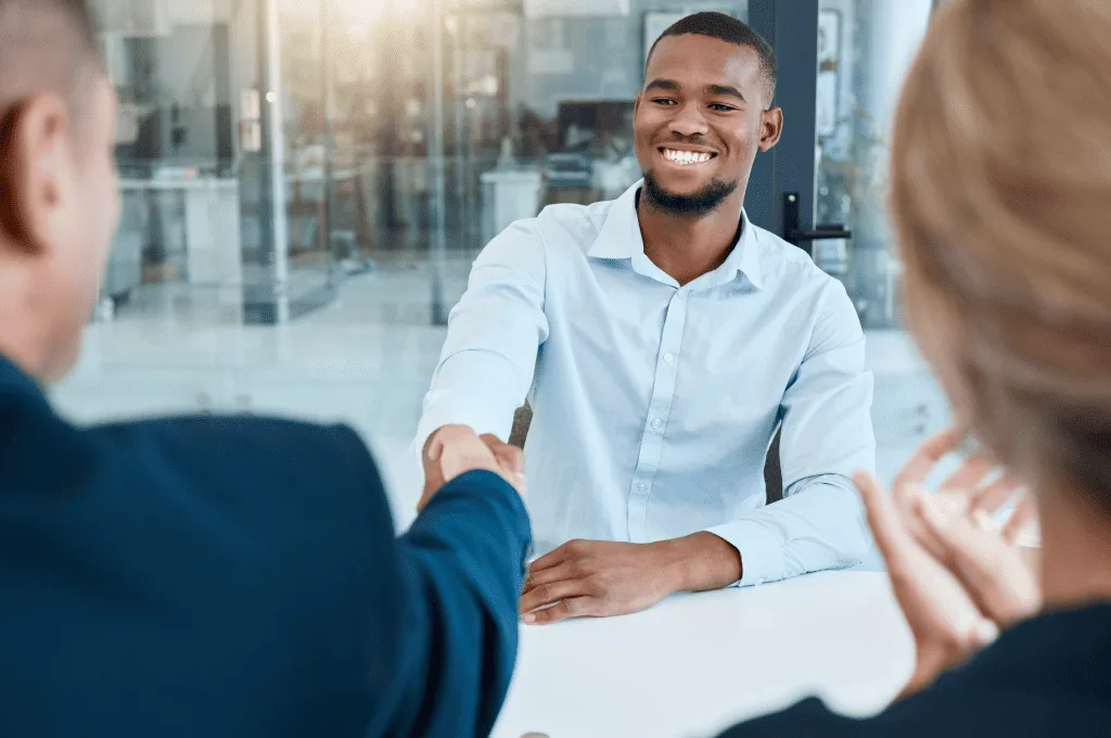 A person shaking hands with others