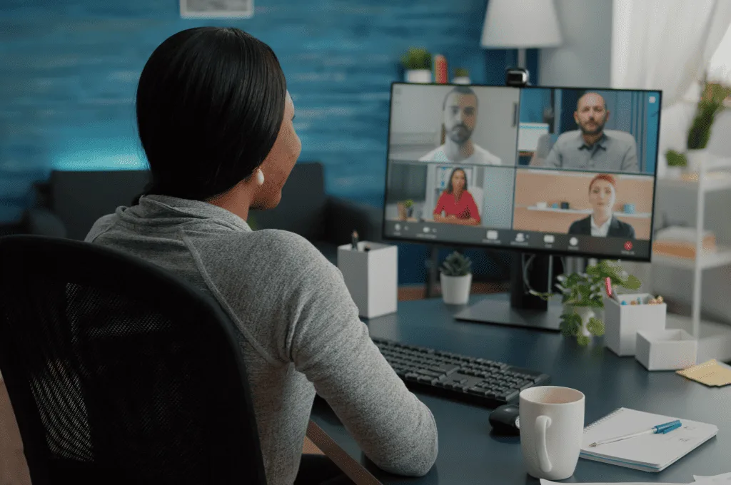 An Individual Having a Discussion with the HR Team in a Virtual Teleconference Meeting

