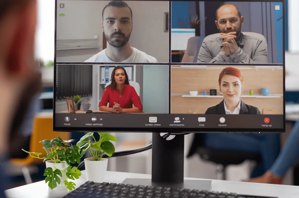 Individual talking with someone on a video online conference