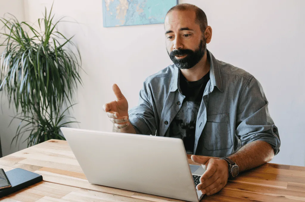 Man explaining something when talking to someone online