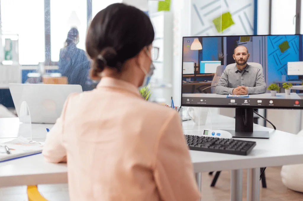 Woman talking to other people on a video call