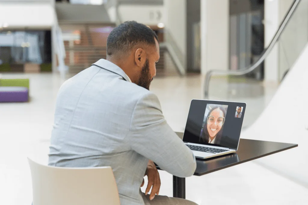 Young Man Answering Questions During an Online Interview