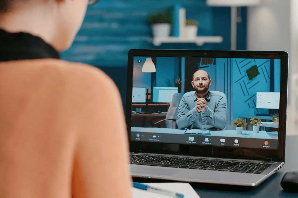 Young women have a discussion through an online video session