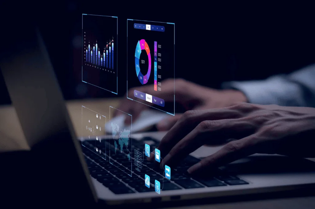 HR working on a real notebook with illustrated analytics displayed, in dark purple and blue tones.