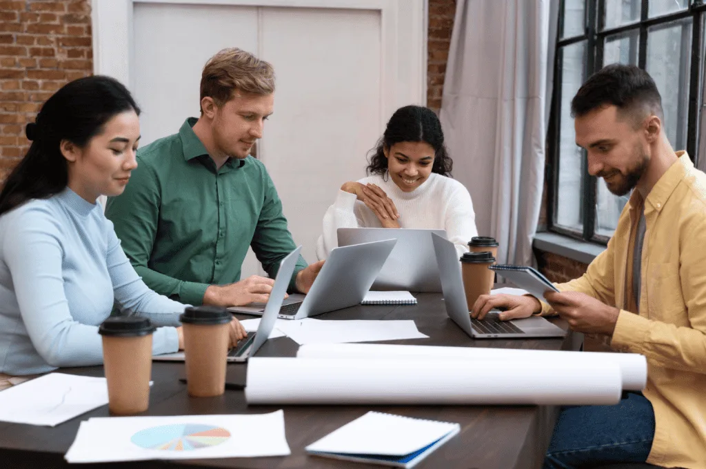 Recruitment team looking into Key Performance Metrics for Remote Workforce Analysis