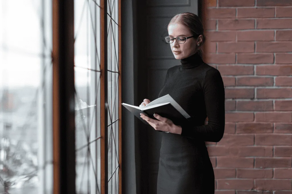HR manager reading new books for information
