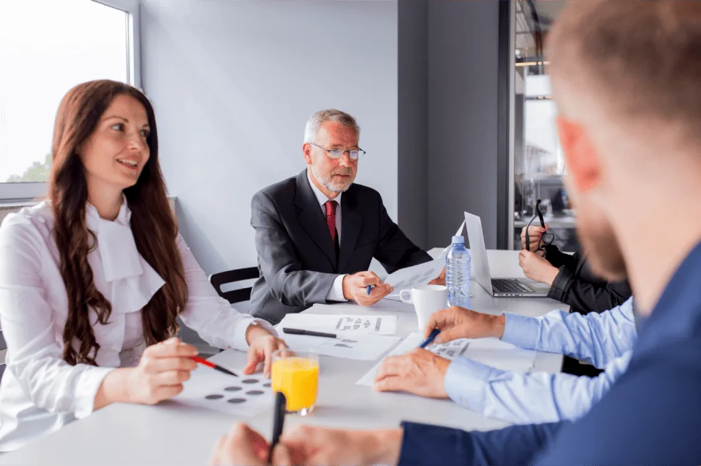 Recruiter Discussing Feedback-Driven Teams with an HR Manager