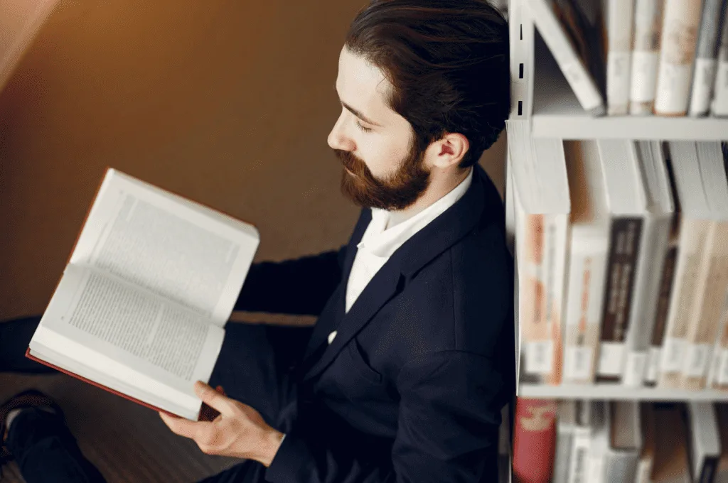 Recruiter reading books for their own information