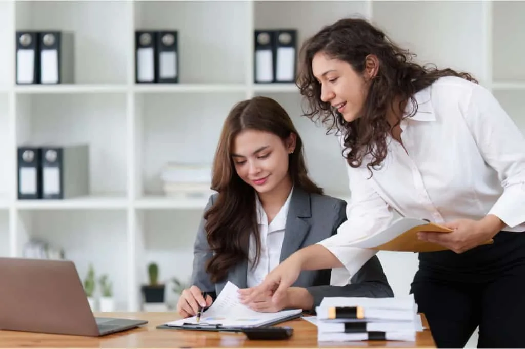 HR Executives Discussing Ideal Recruitment Process Timing To Send Survey