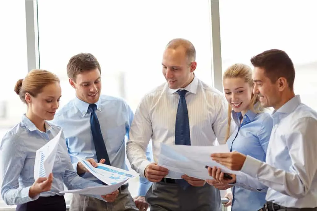 HR Team Disucussing Ways For Keeping Surveys Fresh