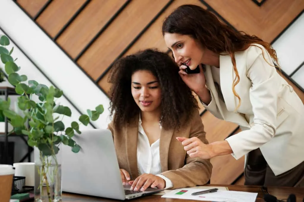 Recruiters Discussing Candidate Opinion Polls and Survey Effectiveness