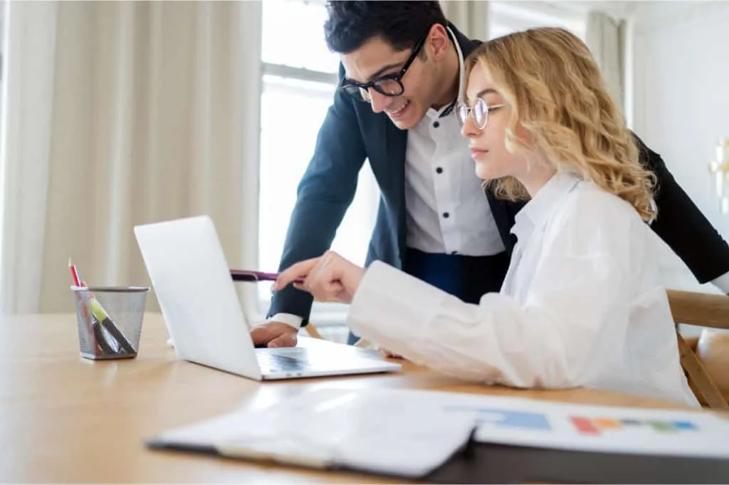 Recruiters Discussing Strategic Survey Distribution
