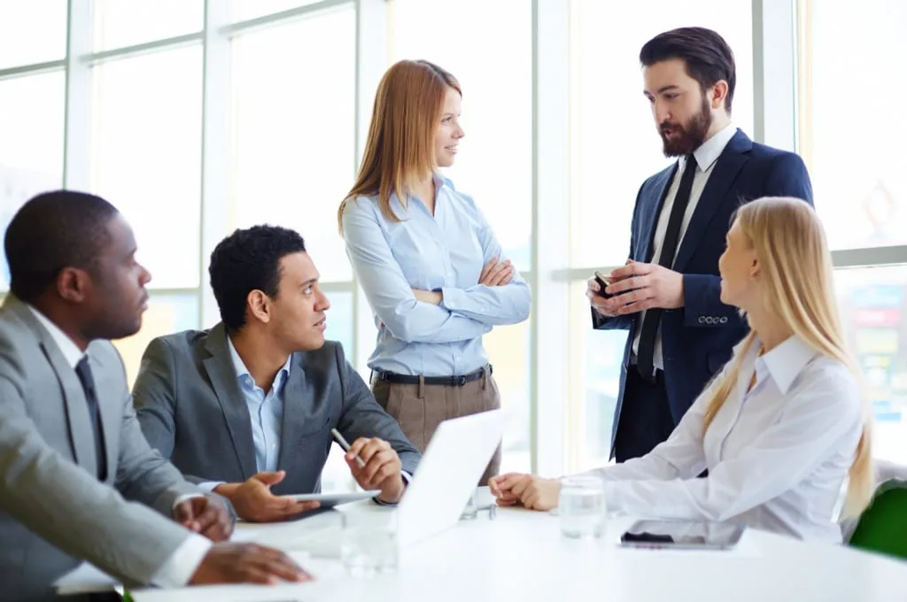 Recruiters Discussing Survey Implementation